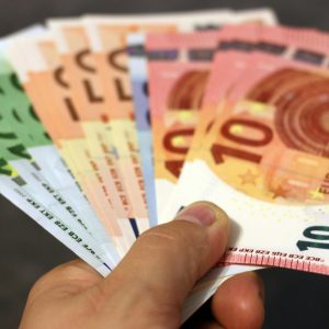 pexels-photo-259251-259251 A fan of euro banknotes in various denominations held in a hand.